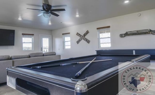 game room with ceiling fan, a wealth of natural light, and billiards