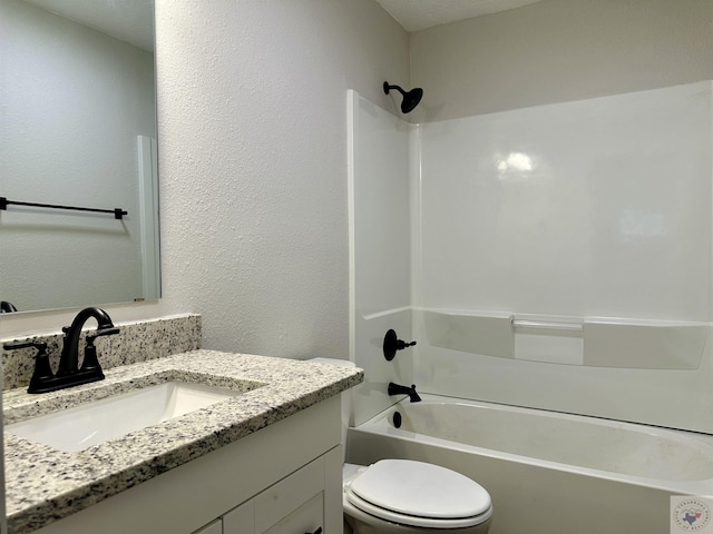 full bathroom featuring toilet, shower / bathing tub combination, and vanity