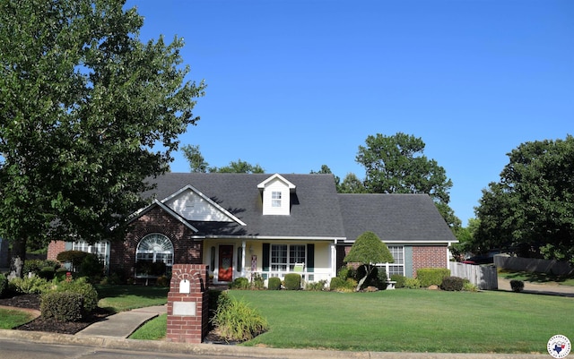 6002 Forest Bnd, Texarkana, AR 71854 - view of front of house with brick siding and a porch