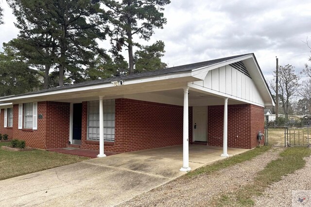 view of front of house with a carport