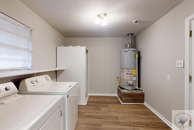 laundry area with separate washer and dryer, wood-type flooring, and gas water heater