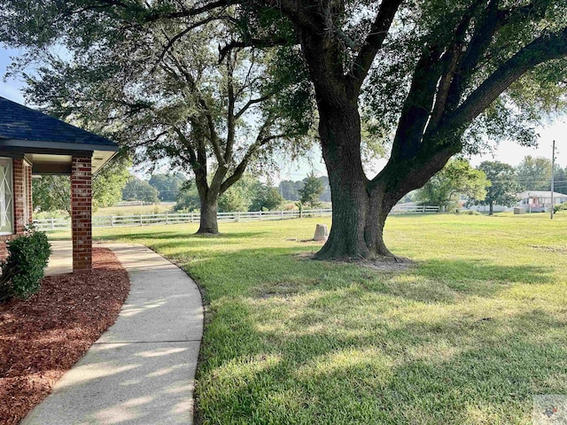 view of community with a lawn