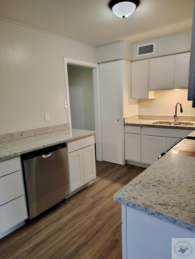 kitchen featuring sink, white cabinets, dark hardwood / wood-style floors, and dishwasher