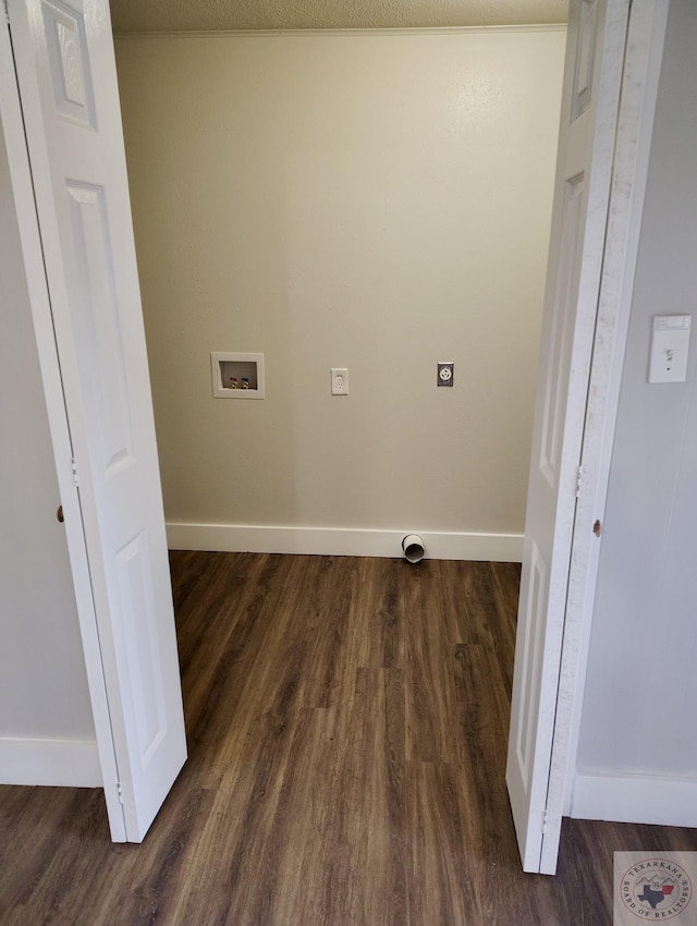 laundry room featuring hookup for a washing machine, dark hardwood / wood-style floors, and hookup for an electric dryer