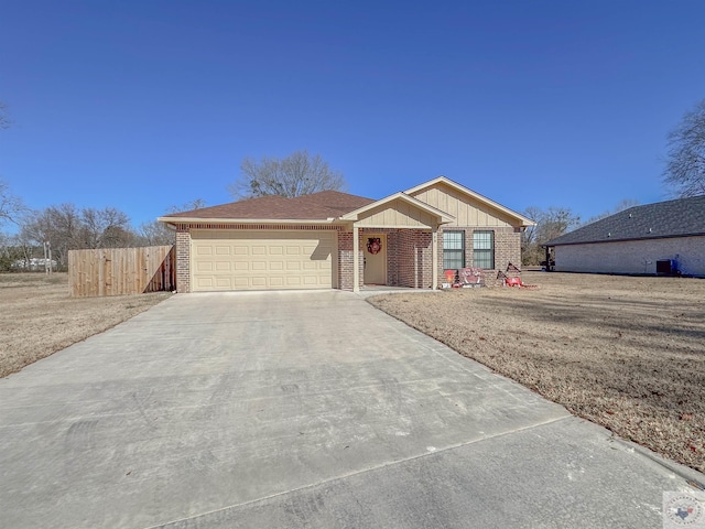 ranch-style home featuring a garage