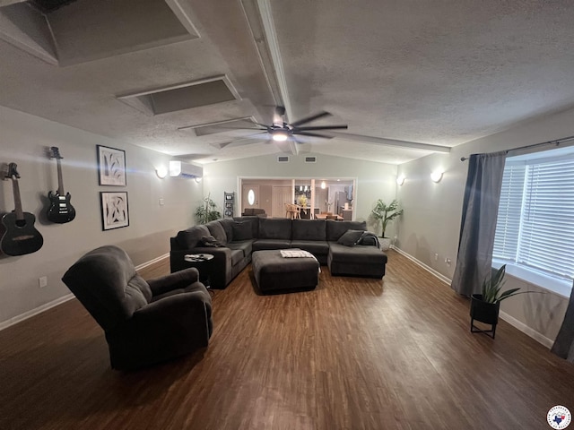 4801 Sanderson Ln, Texarkana, AR 71854 - living area featuring wood finished floors, ceiling fan, vaulted ceiling, a textured ceiling, and attic access