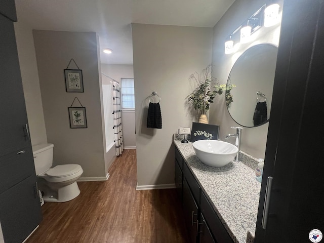 4801 Sanderson Ln, Texarkana, AR 71854 - bathroom with vanity, wood finished floors, and a shower with shower curtain