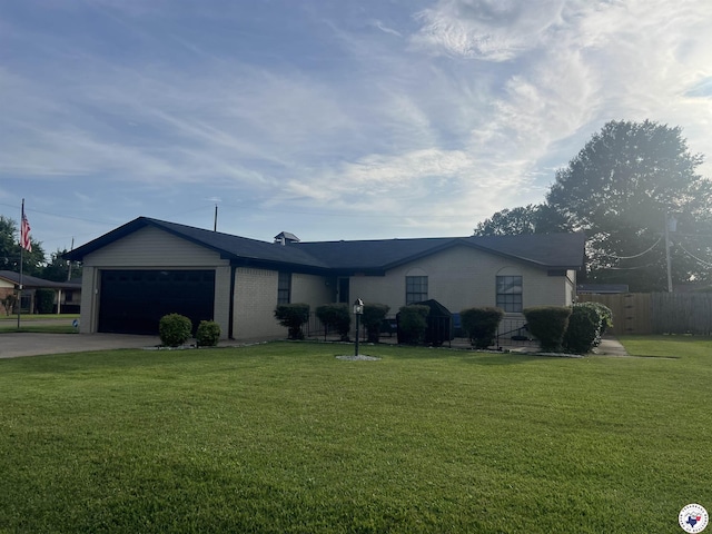 4801 Sanderson Ln, Texarkana, AR 71854 - ranch-style house featuring an attached garage and driveway