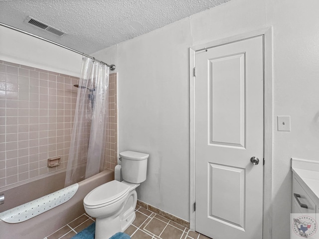 full bathroom featuring tile patterned flooring, a textured ceiling, toilet, vanity, and shower / bathtub combination with curtain