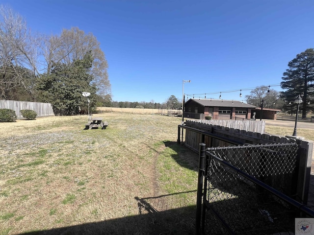 view of yard featuring fence