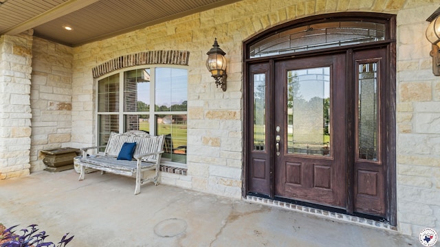 588 B K Pickering Dr, Texarkana, TX 75501 - doorway to property with stone siding and a porch