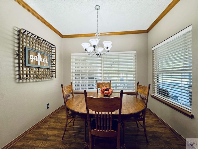 dining area with crown molding, an inviting chandelier, dark wood-type flooring, and plenty of natural light