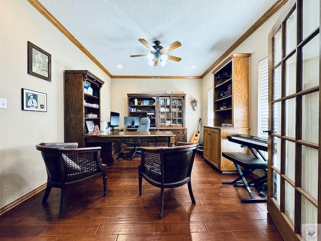 office space featuring ceiling fan, dark wood-type flooring, a textured ceiling, and crown molding