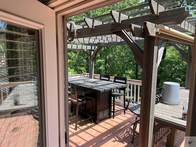 wooden deck with a pergola