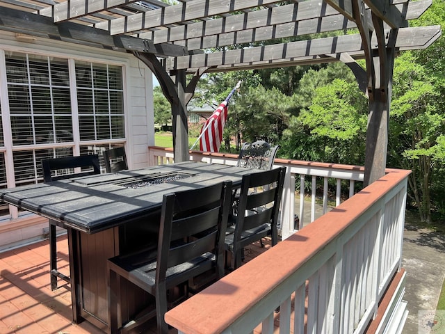 wooden terrace with a pergola