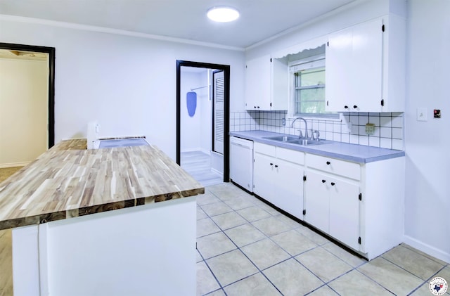 417 Carroll Ave, Wake Village, TX 75501 - kitchen featuring white dishwasher, tasteful backsplash, white cabinetry, ornamental molding, and light countertops