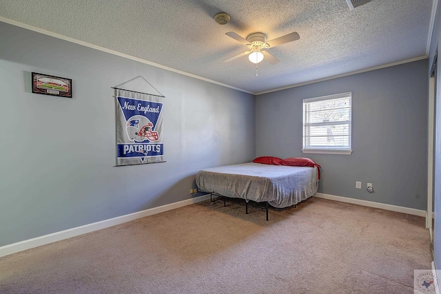 bedroom featuring ornamental molding, ceiling fan, baseboards, and carpet floors