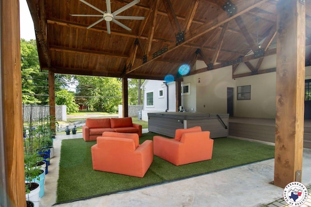 3302 Olive St, Texarkana, TX 75503 - view of patio with a hot tub, a ceiling fan, a gazebo, and outdoor lounge area