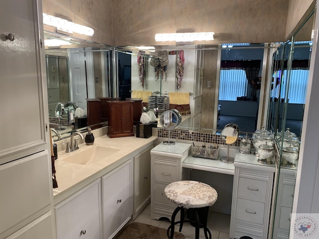 bathroom featuring vanity and tile patterned floors