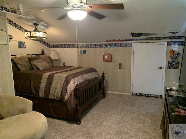 bedroom featuring light carpet and ceiling fan