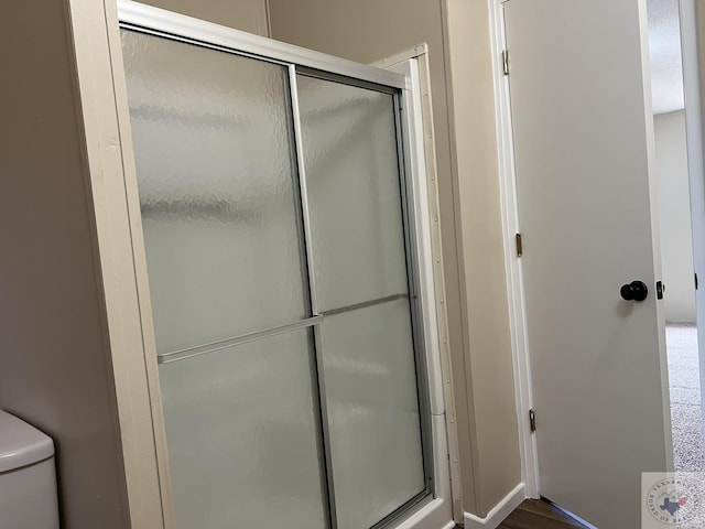 119 Krobot Cir, Texarkana, TX 75503 - bathroom featuring toilet and walk in shower