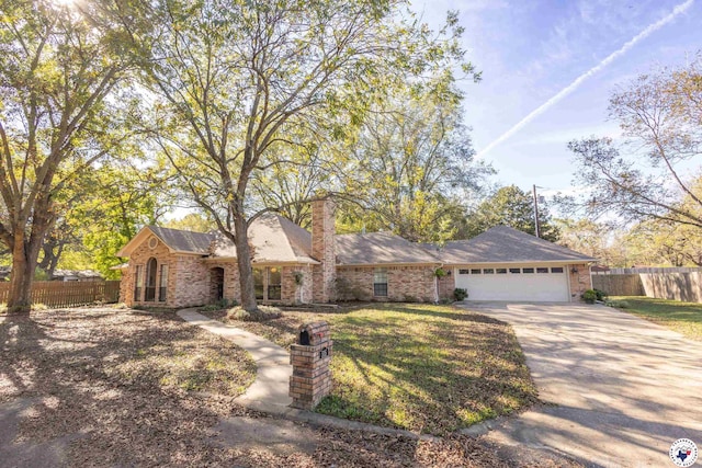 505 Langford Ln, New Boston, TX 75570 - ranch-style home featuring a garage, driveway, and brick siding