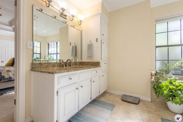 505 Langford Ln, New Boston, TX 75570 - bathroom with ensuite bathroom, crown molding, vanity, and baseboards