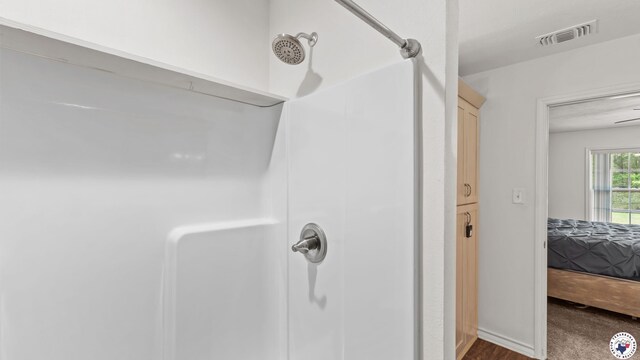 242 County Road 4228, Atlanta, TX 75551 - full bathroom featuring a shower and ensuite bath
