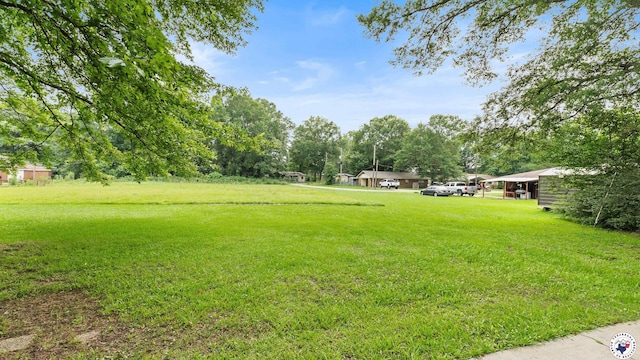 10 Vernon St, Hooks, TX 75561 - view of grassy yard