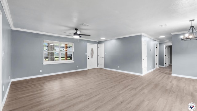 10 Vernon St, Hooks, TX 75561 - unfurnished living room featuring ornamental molding, a ceiling fan, light wood-style floors, a chandelier, and recessed lighting