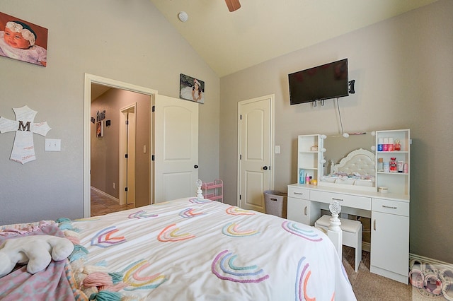 carpeted bedroom with vaulted ceiling and ceiling fan