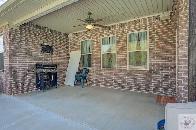 view of patio featuring ceiling fan and grilling area