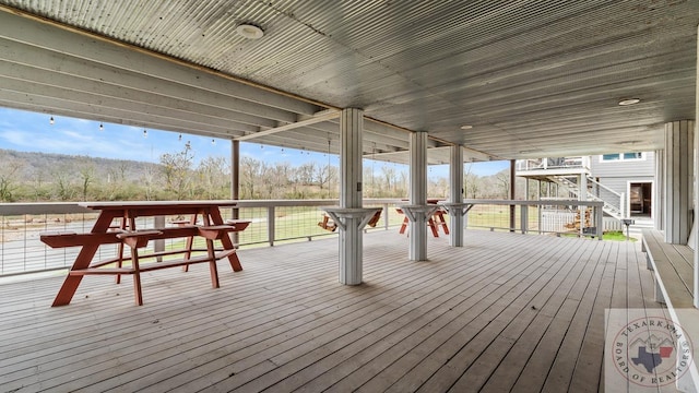 wooden terrace featuring stairway