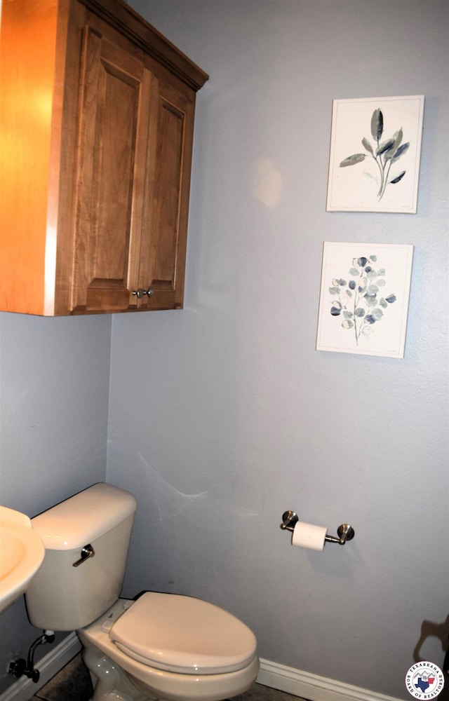 2905 Landon Ln, Texarkana, TX 75503 - half bathroom with toilet and baseboards
