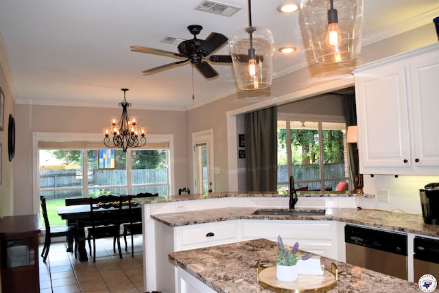 2905 Landon Ln, Texarkana, TX 75503 - kitchen featuring dishwasher, tile patterned flooring, hanging light fixtures, white cabinetry, and ornamental molding