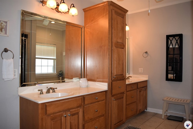 2905 Landon Ln, Texarkana, TX 75503 - bathroom with double vanity, ornamental molding, and tile patterned floors