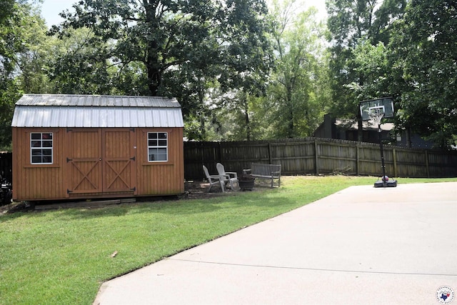 2905 Landon Ln, Texarkana, TX 75503 - view of yard with a patio area, a shed, and an outdoor fire pit