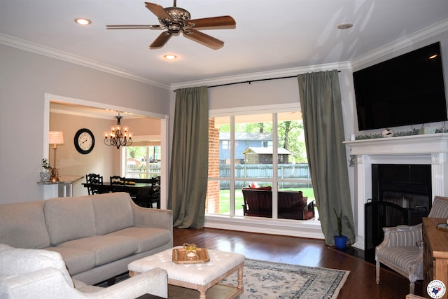 2905 Landon Ln, Texarkana, TX 75503 - living room with a chandelier, ornamental molding, dark wood-type flooring, a ceiling fan, and recessed lighting
