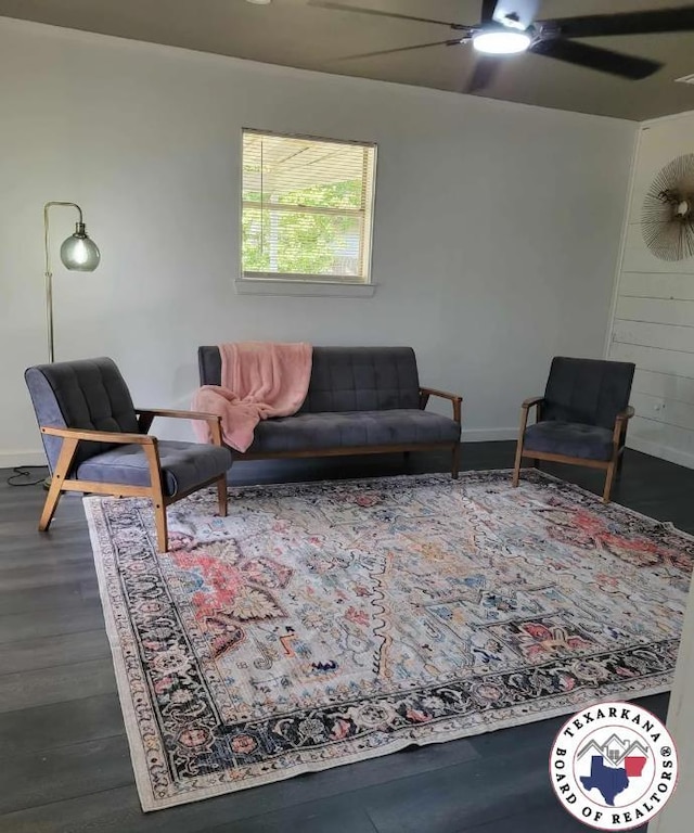 103 S Merrill St, New Boston, TX 75570 - living area with a ceiling fan, dark wood-style flooring, and baseboards