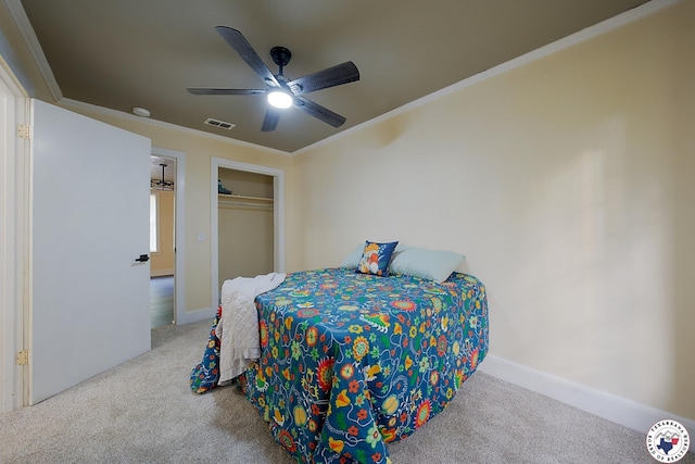 103 S Merrill St, New Boston, TX 75570 - bedroom featuring carpet floors, crown molding, ceiling fan, a closet, and baseboards