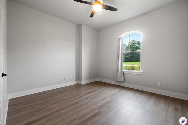 8409 Mandarin Cv, Texarkana, TX 75503 - spare room with a ceiling fan, wood finished floors, and baseboards