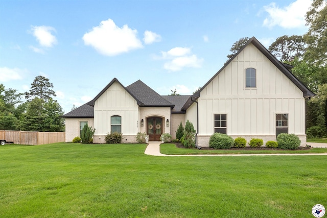 8409 Mandarin Cv, Texarkana, TX 75503 - view of front of house with board and batten siding, french doors, a shingled roof, and brick siding
