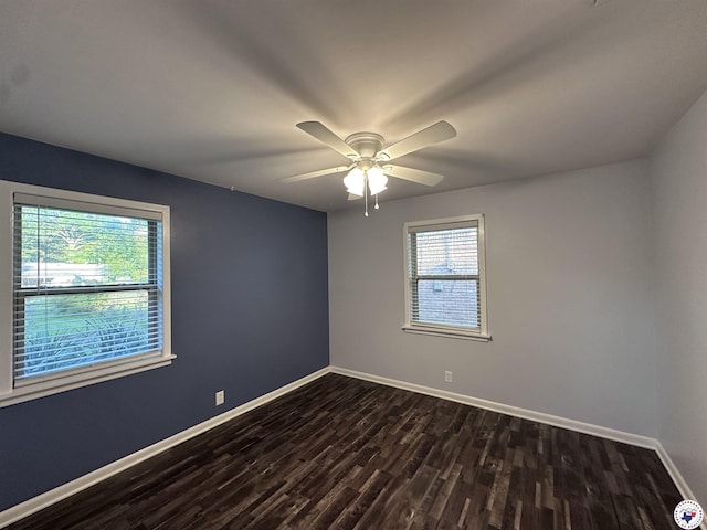 3706 Greenwood St, Texarkana, AR 71854 - unfurnished room featuring dark wood-style floors, plenty of natural light, baseboards, and ceiling fan
