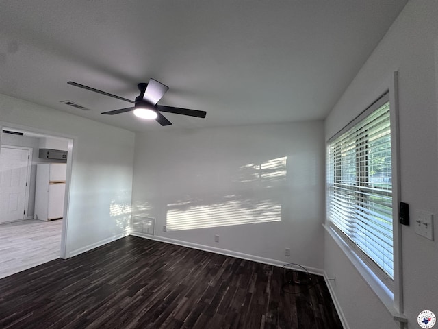 3706 Greenwood St, Texarkana, AR 71854 - unfurnished room with wood finished floors, baseboards, and ceiling fan