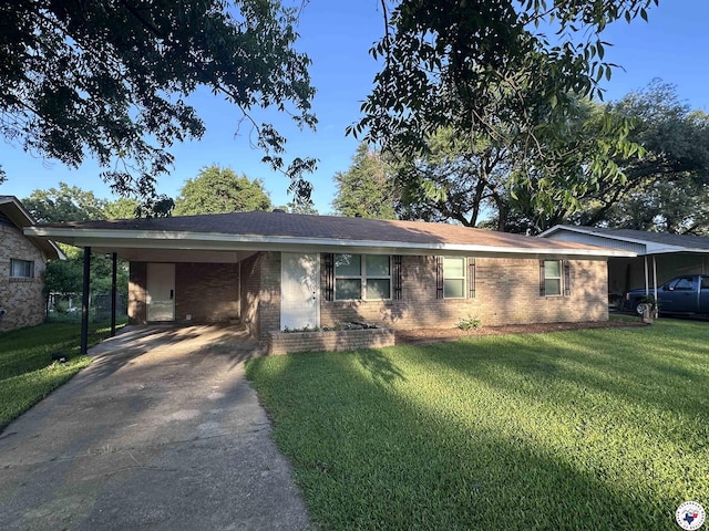 3706 Greenwood St, Texarkana, AR 71854 - ranch-style house featuring brick siding, a front lawn, driveway, and a carport