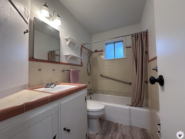 3706 Greenwood St, Texarkana, AR 71854 - full bathroom with toilet, shower / bathtub combination with curtain, vanity, wood finished floors, and tile walls