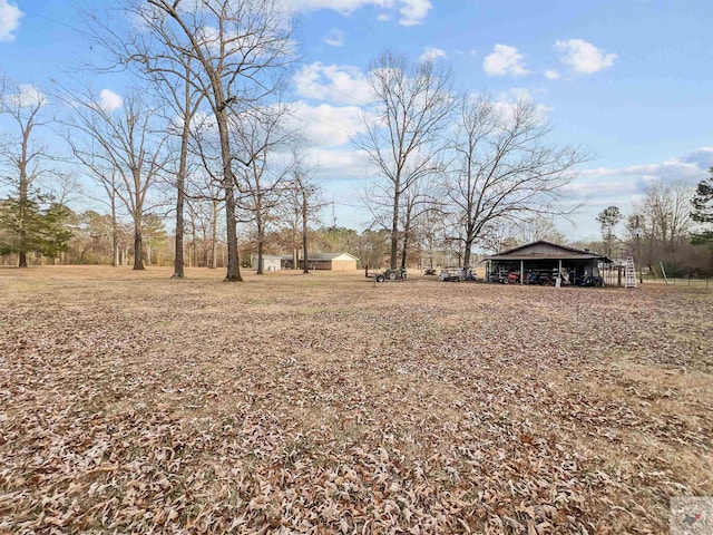 view of yard with a carport