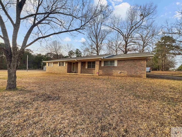 ranch-style home with brick siding