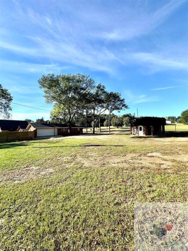 view of yard featuring a garage