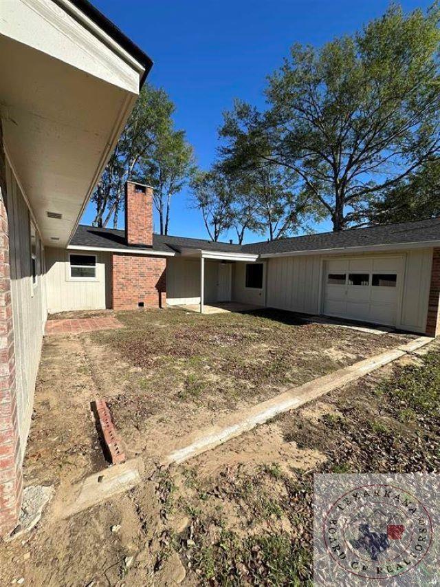 exterior space with a garage